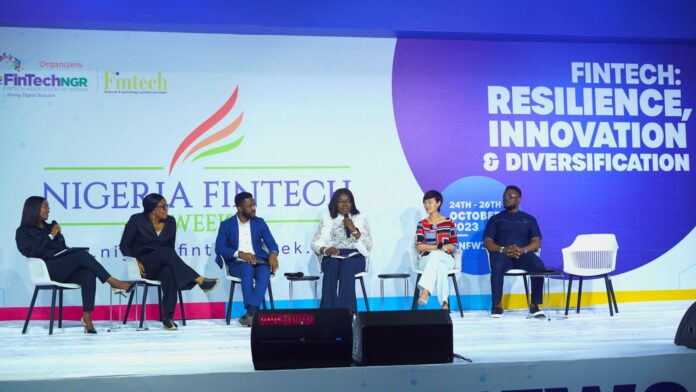 [L-R] Sitting third to right, Folu Aduloju, Head of Operations, PalmPay, alongside other industry stakeholders at the 2023 Nigeria Fintech Week, held at the Landmark Center, Lagos State, on Wednesday, October 25, 2023.