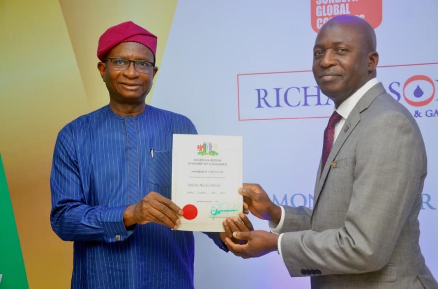 Photo caption:From right: Mr. Kayode Lawal, Managing Director/CEO of Polaris Bank, receiving on behalf of the bank, Premium Membership Certificate into Nigerian-British Chamber of Commerce (NBCC) from Mr. Kayode Falowo, NBCC’s Ex-President/Chairman, Greenwich Merchant Bank in Lagos recently.